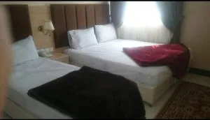 اتاق هتل آپارتمان سبز طلایی مشهد