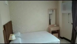 اتاق هتل آپارتمان سبز طلایی مشهد