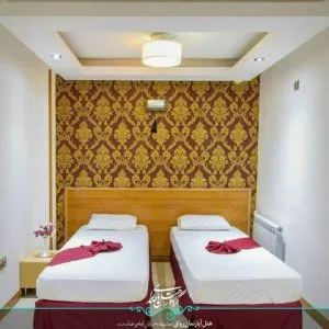 اتاق هتل رواق مشهد